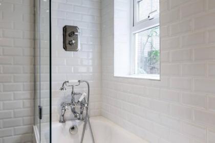 Bright 1BR Modern Home w/Terrace in West London - image 16