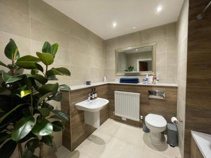Quiet Luxe Home with GYM and Free Parking - image 9