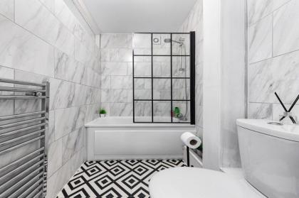 Lavish 1 Bedroom flat next to Arsenal & train - image 16